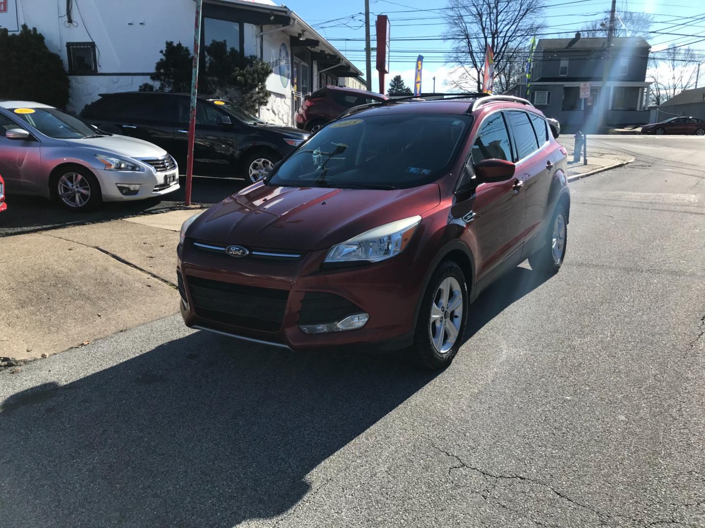 2015 Red /Gray Ford Escape SE (1FMCU9GX6FU) with an 1.6 V4 engine, Automatic transmission, located at 577 Chester Pike, Prospect Park, PA, 19076, (610) 237-1015, 39.886154, -75.302338 - Photo#2